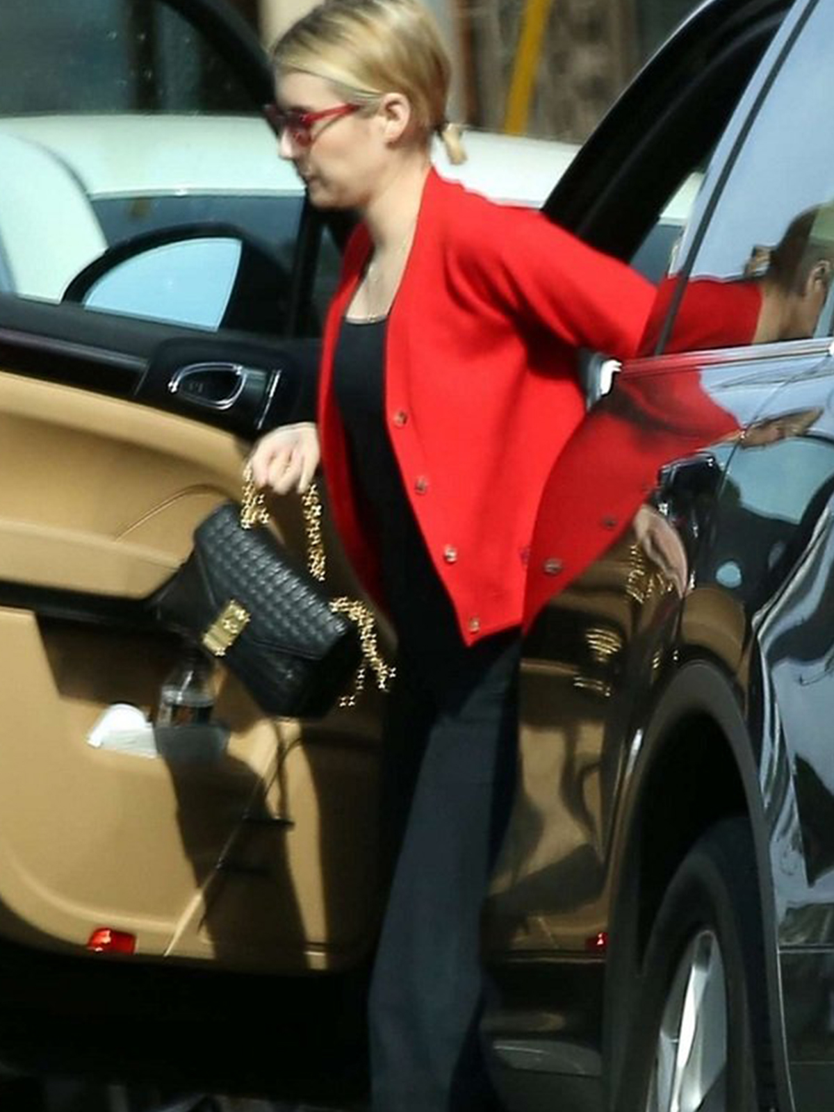 Emma Roberts Festive Stylish Red Jacket